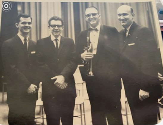 This was taken in Arkansas when Dave Ritter taught at State Teachers College,
Left to right: Glen Campbell (Band Director at Conway H.S. Conway, AR), Dave Ritter, John Haynie, Homer Brown (Band Director at Arkansas State Teacher College)